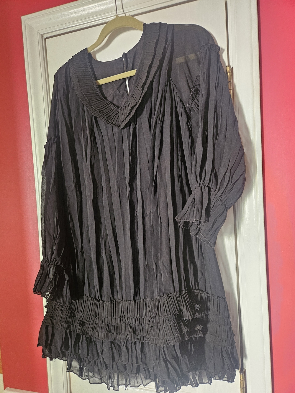 Black Ruffle V‑Neck Tunic with Pleated Hem